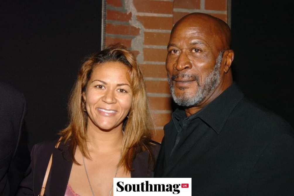 Noel Mickelson met John Amos